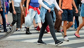 People crossing the pedestrian crossing